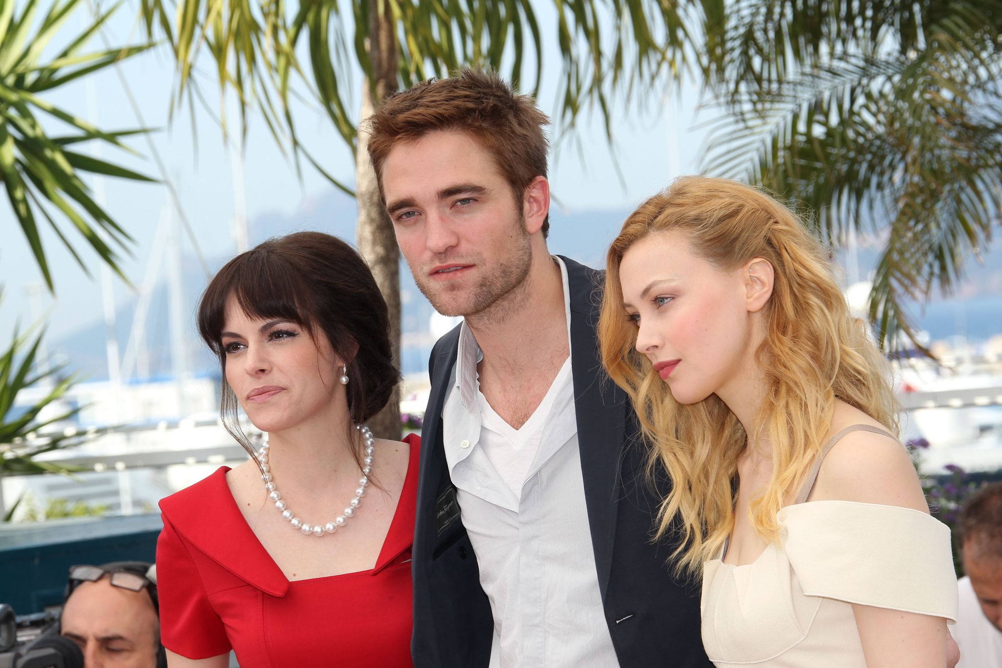 Sarah Gadon, Emily Hampshire and Robert Pattinson at event of Kosmopolis (2012)