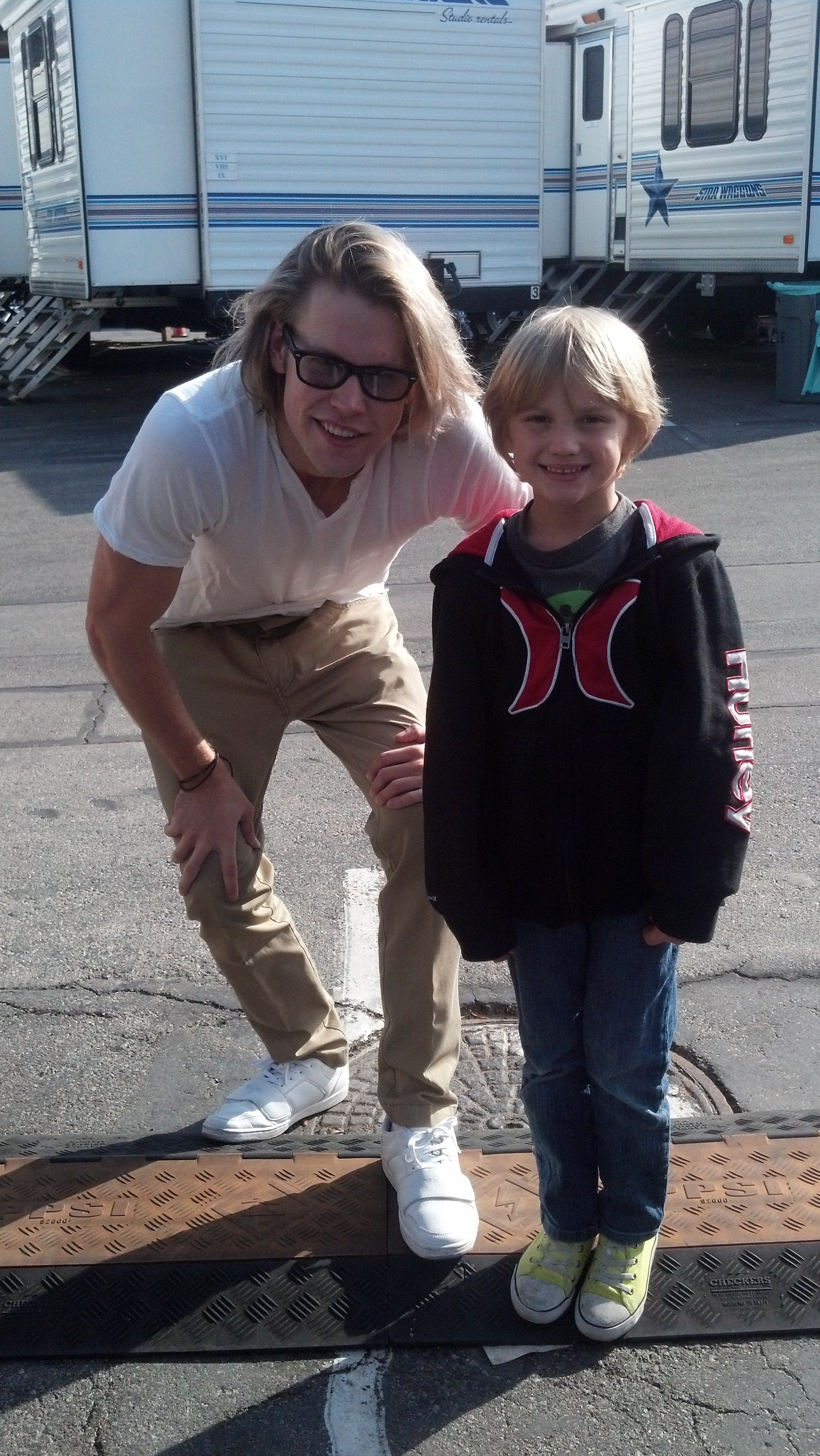 Mason McNulty with Chord Overstreet on the set of Glee