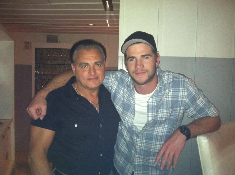 With Liam Hemsworth ( Empire State )