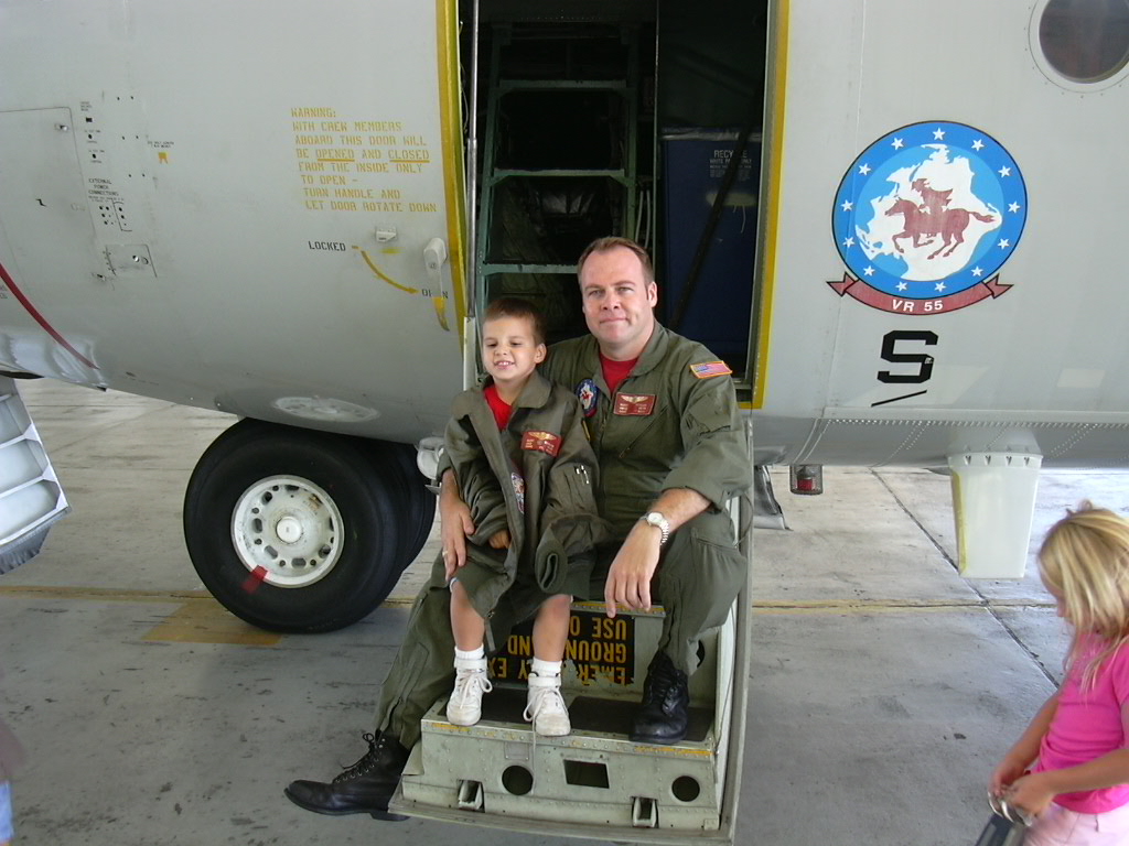 This a Pic of my son, Luke and I at Pt. Mugu. The plane is a C-130t. GO NAVY!