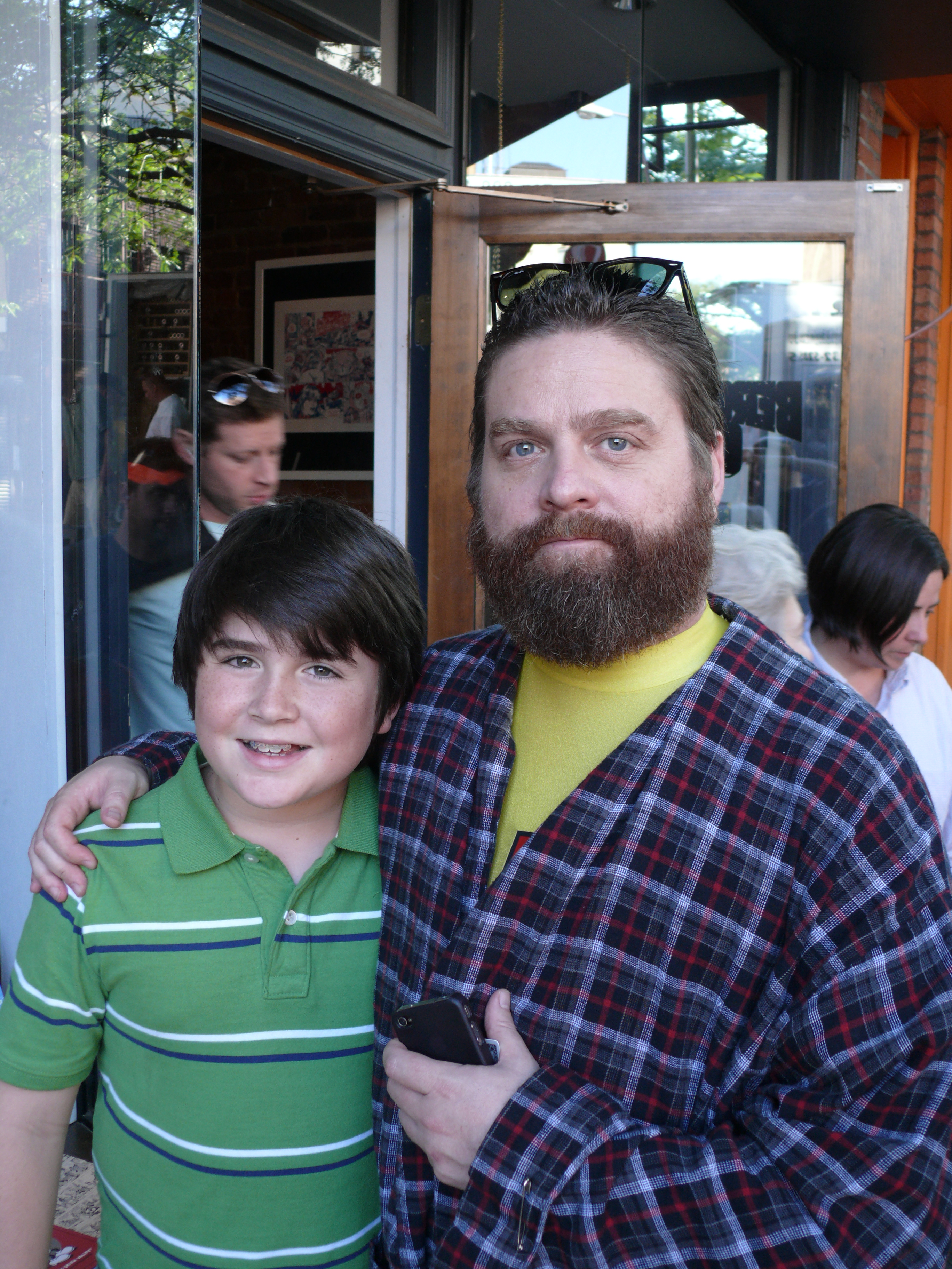 Still of Harrison Holzer and Zach Galifianakis on the set of Bored to Death