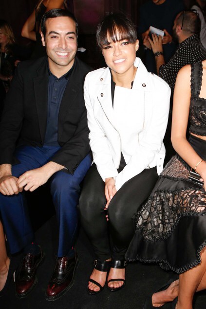Mohammed Al Turki and Michelle Rodriguez attend the Atelier Versace show as part of Paris Fashion Week Haute Couture Fall/Winter 2015/2016 on July 5, 2015 in Paris, France.