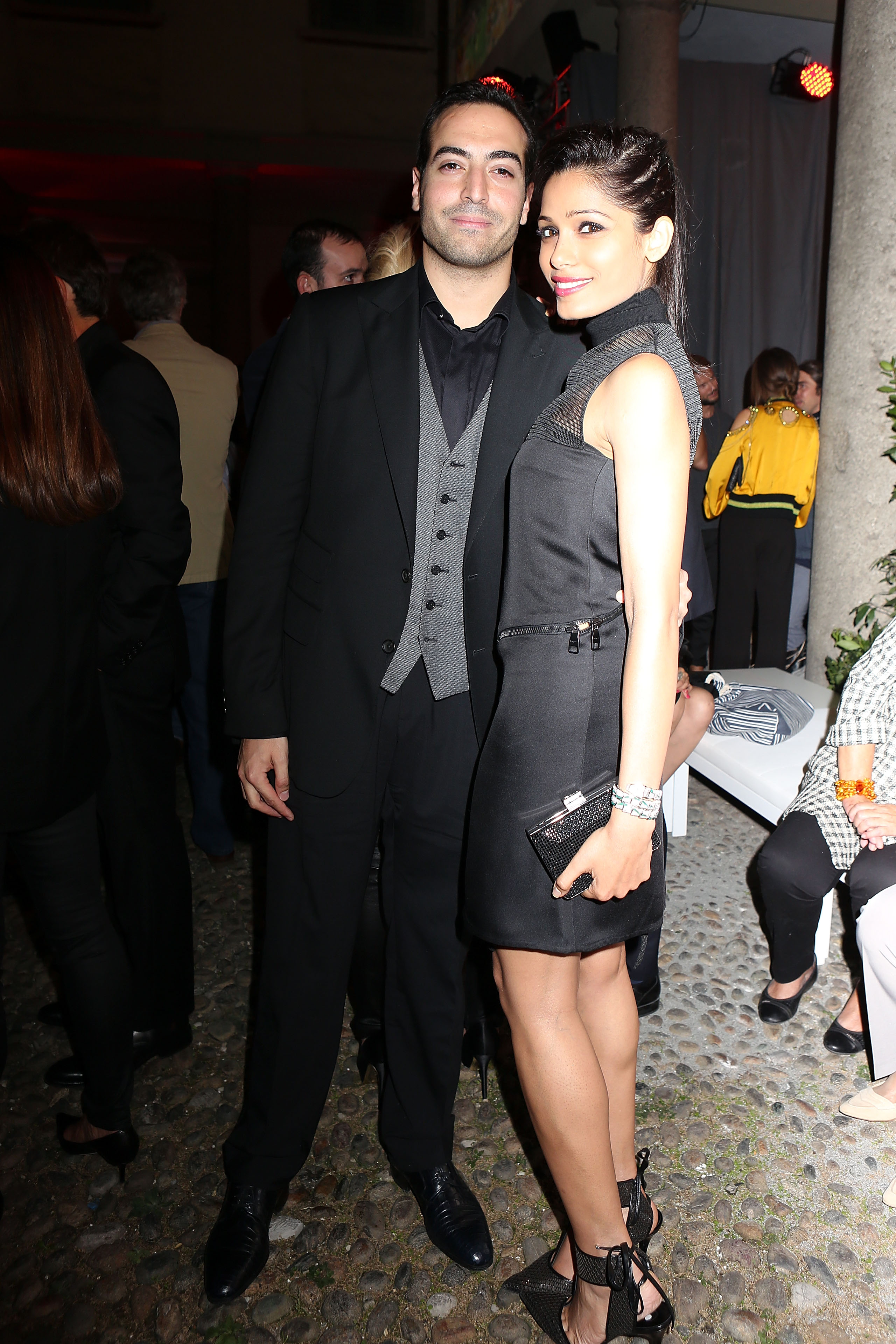 MILAN, ITALY - SEPTEMBER 20: Mohammed Al Turki and Freida Pinto attend the Salvatore Ferragamo Boutique Opening as part of Milan Fashion Week Womenswear Spring/Summer 2014 on September 20, 2013 in Milan, Italy.