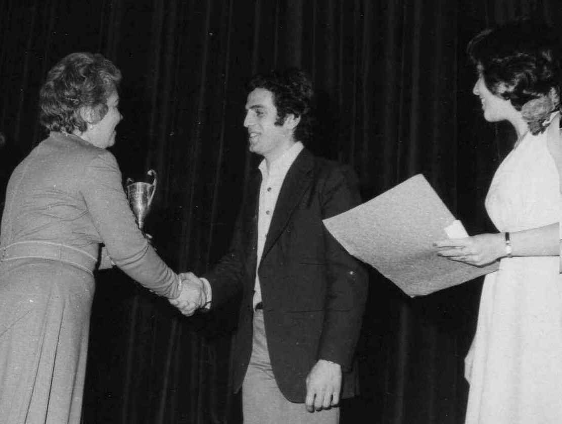Rafy receiving trophy for music composition