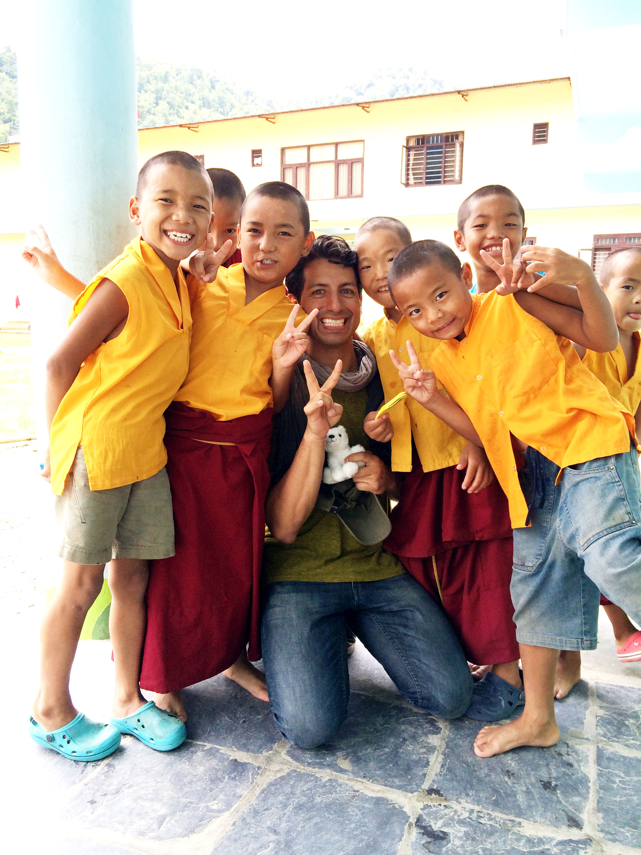 Alex Kruz with young Tibetan Buddhist Monks during filming of 