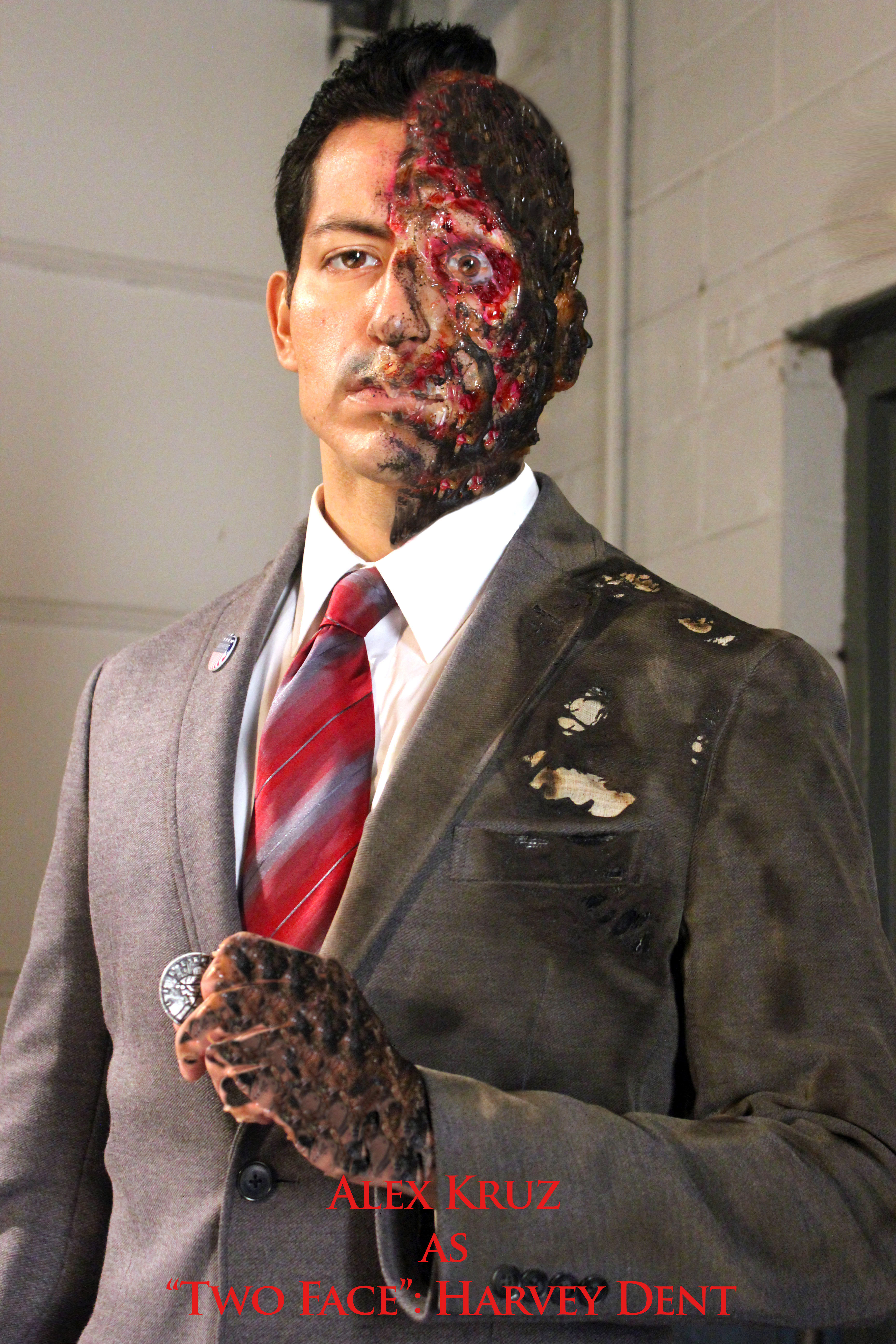Alex Kruz with Two Face makeup which required him to shave his head to hold the makeup down for the role.
