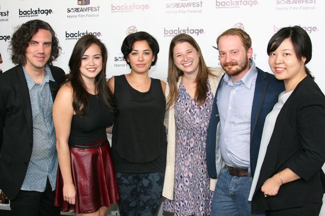 The team from SLUT at the black carpet event for the LA premiere of SLUT at Screamfest Horror Film Festival. From right to left: Composer, Lead Actress [me], Director, Producer, Editor, Production Designer.