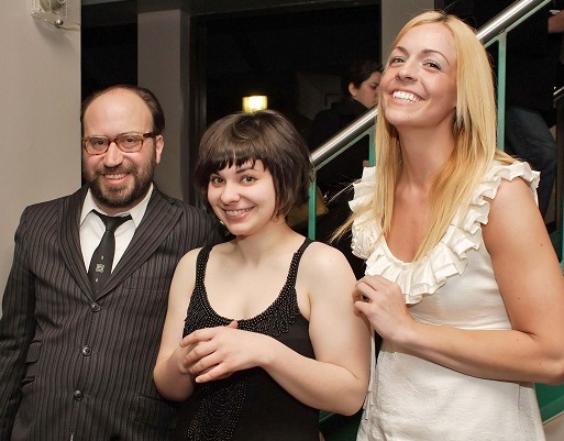 Paul D. Dickinson, Jessica Raymond, and Megan Roesler at the premiere of 