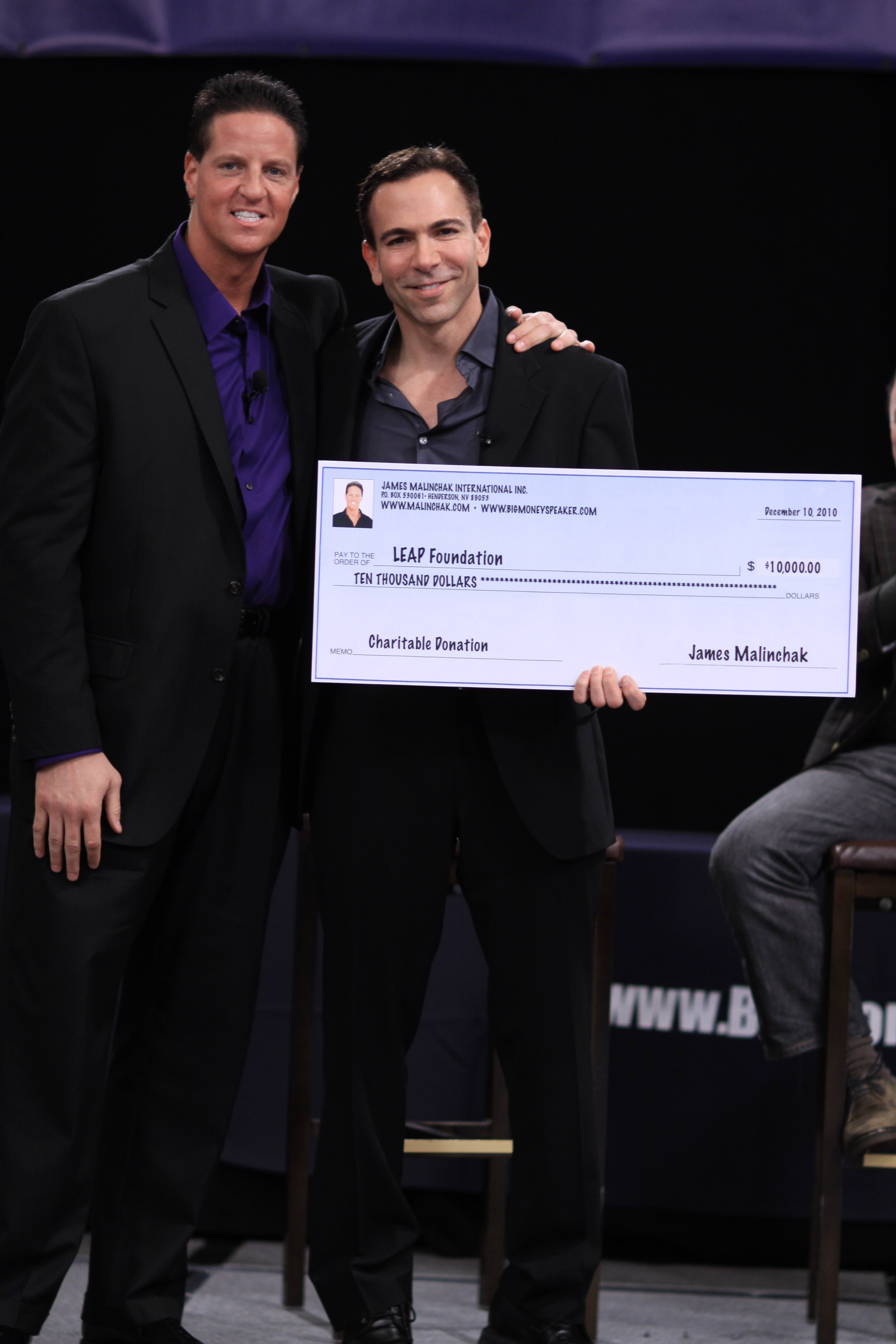 Dr. Bill Dorfman (aka, Dentist to the Stars & on ABCs TV Show Extreme Makeover & CBSs The Doctors) receiving a $10,000 charitable donation from James Malinchak, Featured on ABC's Hit TV Show, Secret Millionaire. James Malinchak is one of Am