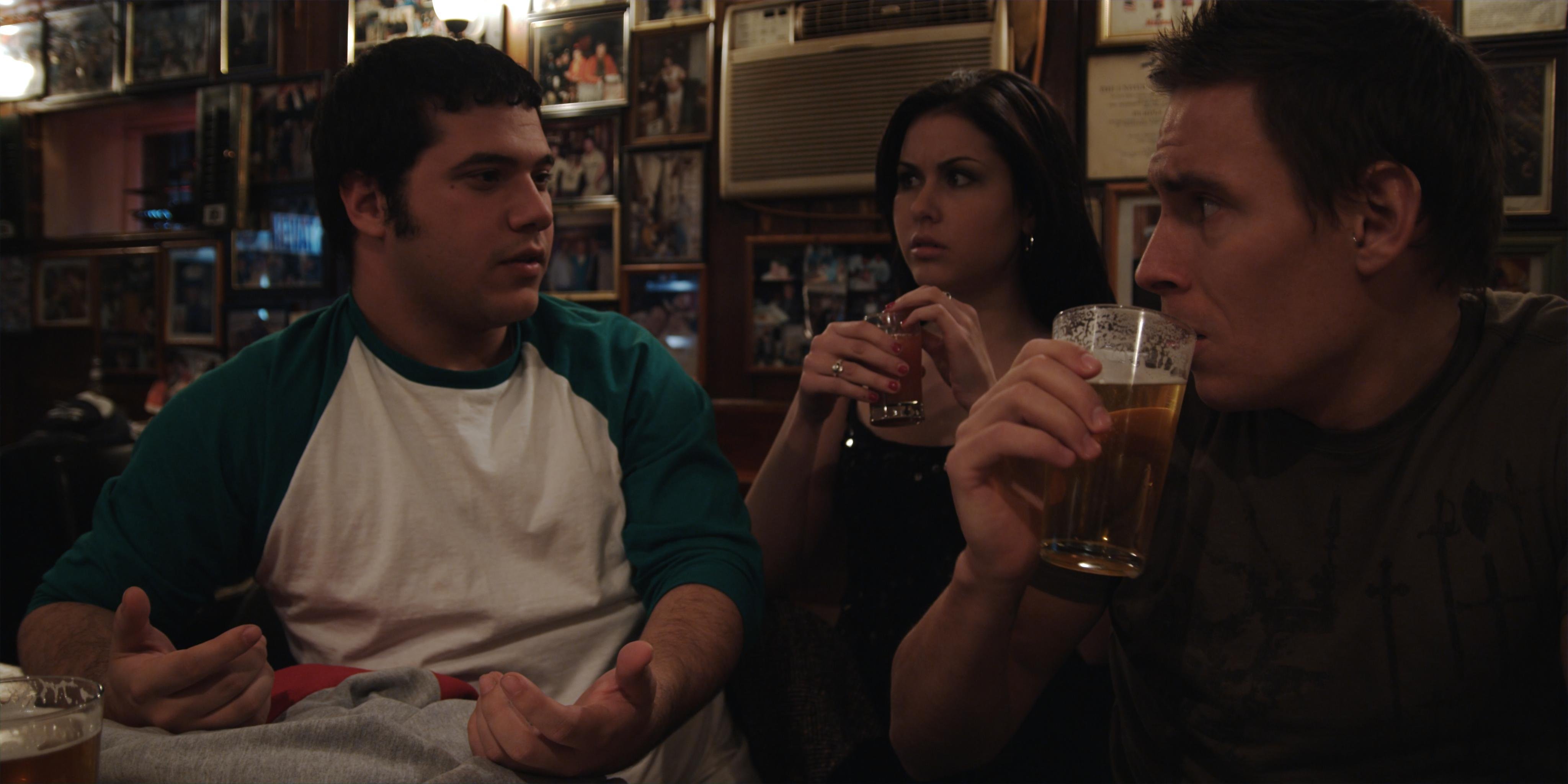Screen shot from the bar scene of Swooped with characters Jack, Julia, and Stan.