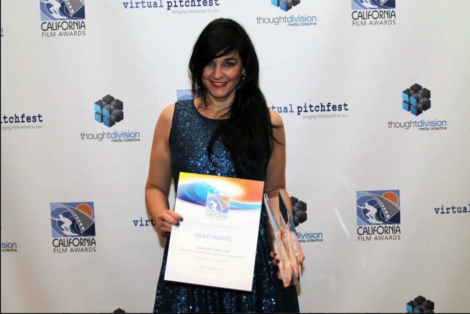 Lead actress, Ivone Reyes with the Gold award received for Best Short at The California Film Awards.