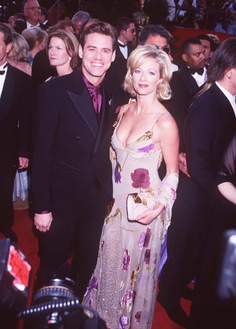 Jim Carrey and Lauren Holly at event of The 69th Annual Academy Awards (1997)