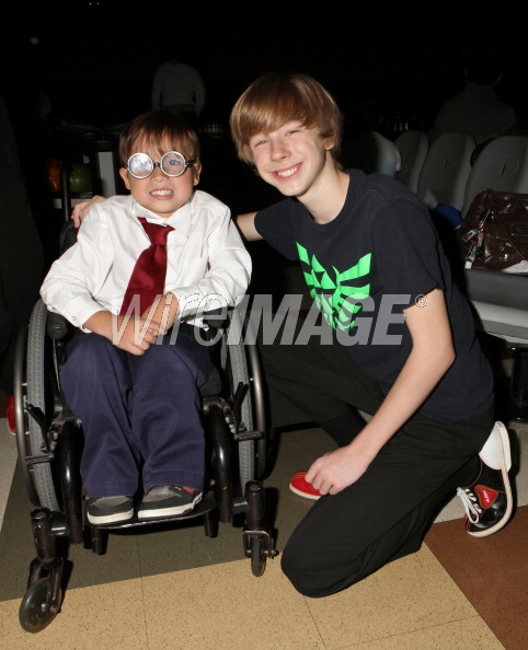 CERRITOS, CA - SEPTEMBER 25: (EXCLUSIVE COVERAGE) Joey Luthman (R) and guest attend the Starlight Children's Foundation's celebrity bowling event on September 25, 2011 in Cerritos, California. (Photo by Tibrina Hobson/WireImage)