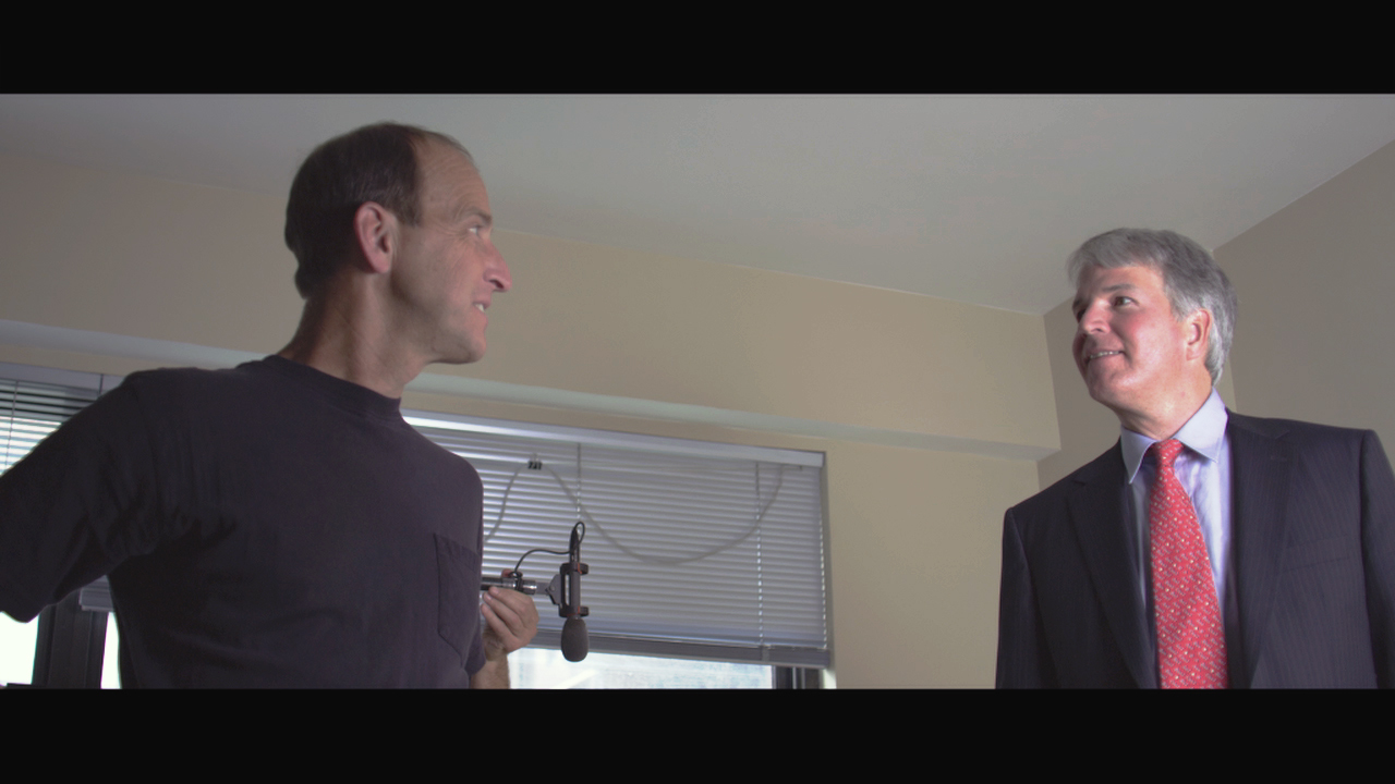 Still of Charles Ferguson and Jerome Fons in Inside Job (2010)