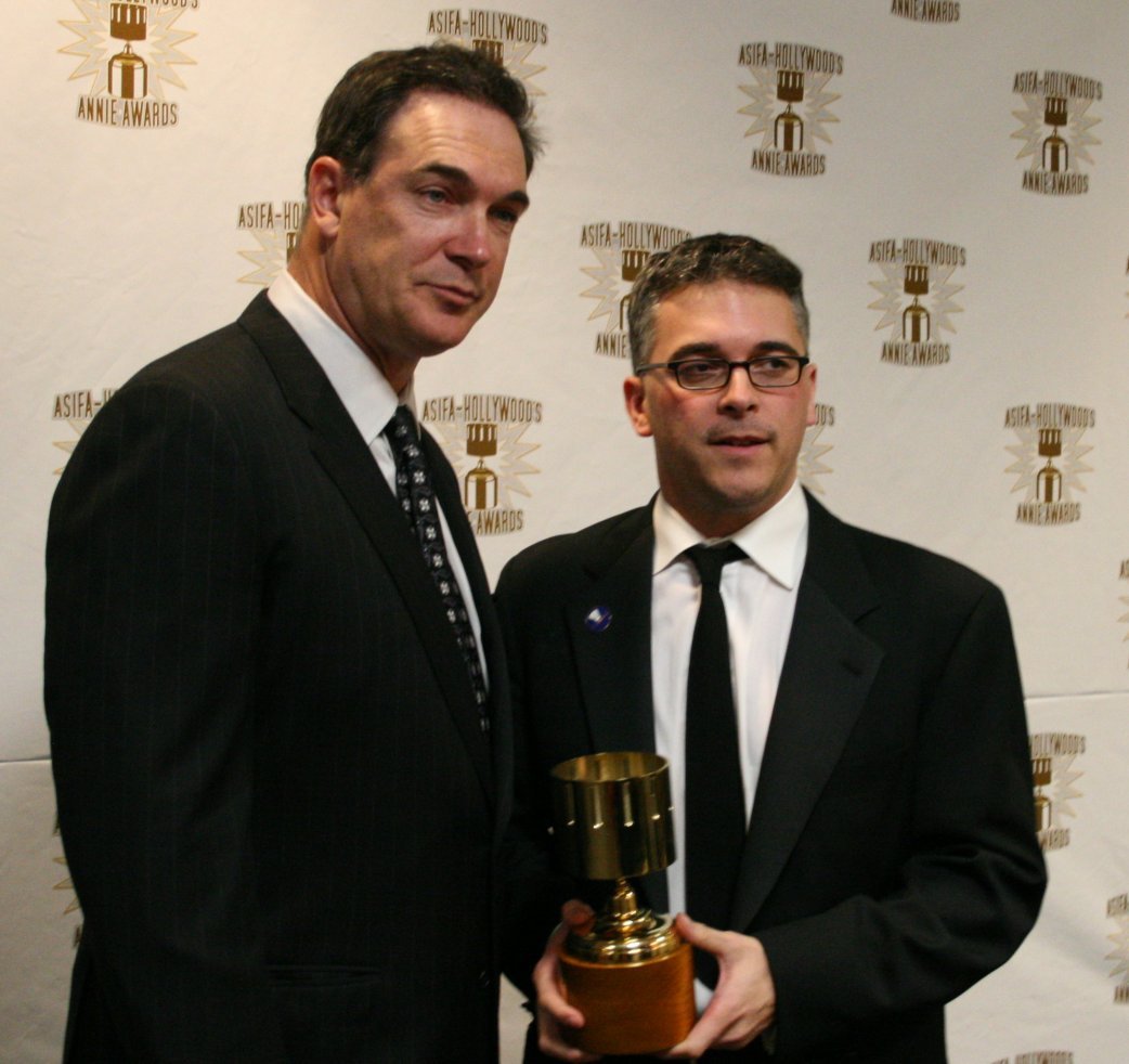 Patrick Warburton congratulates Jim Capobianco for Best Short Subject