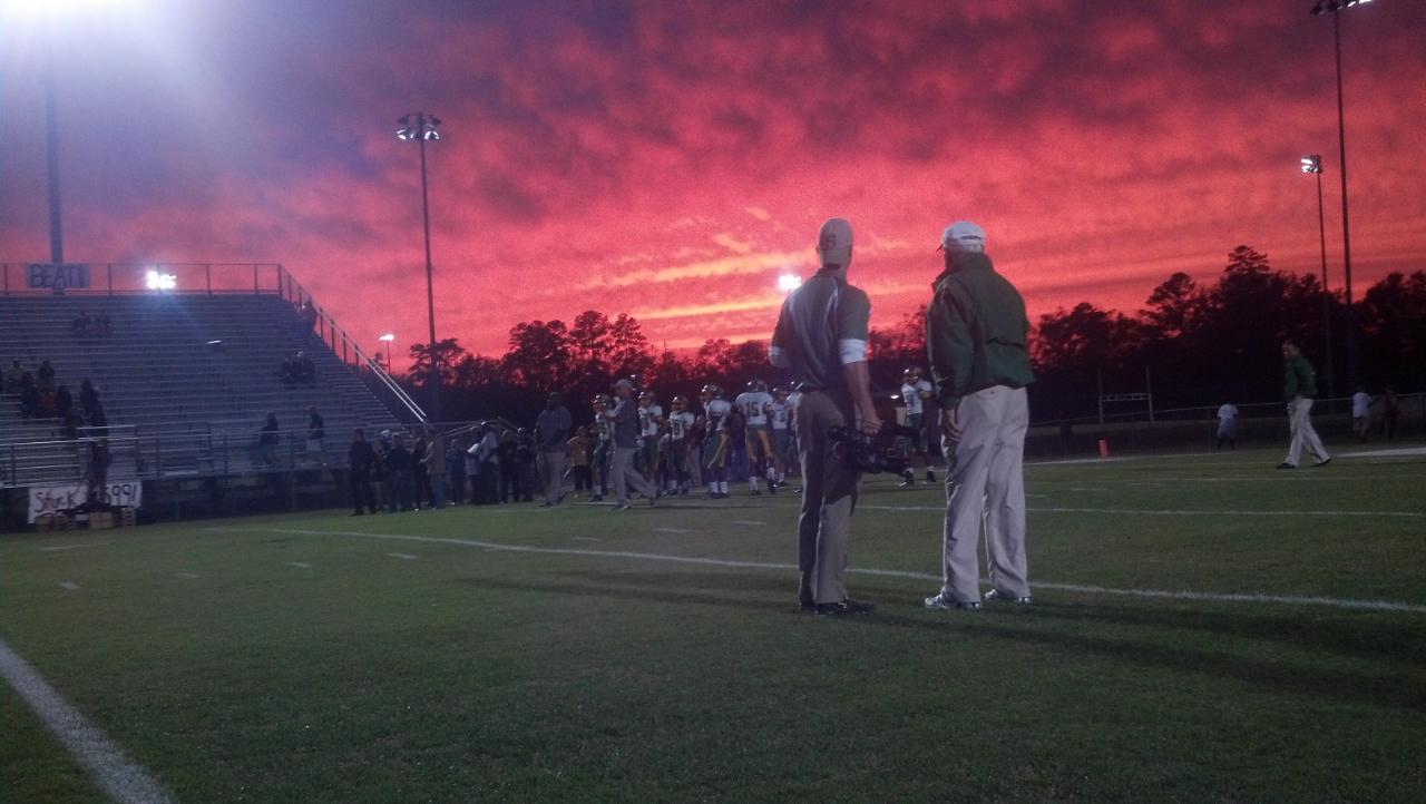 John McKissick, the winningest coach at any level of football in America, pre-game before filming his 600th win at Summerville High School. (Director)