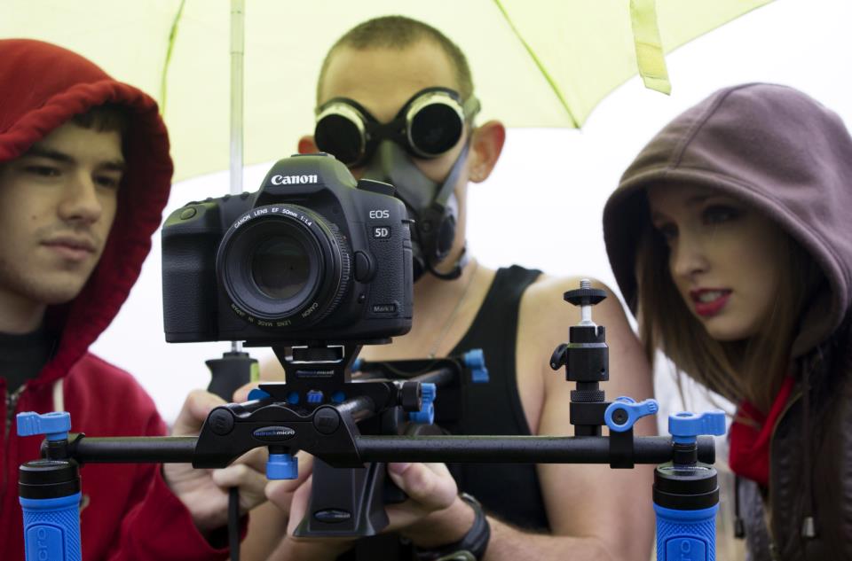 Jeremy Vincent Comn reviewing footage on the set of 