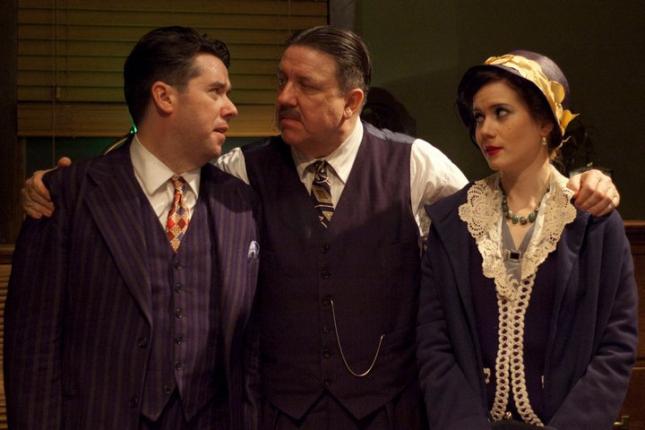 Terry Hamilton (center) as Walter Burns in TimeLine Theatre's production of The Front Page.