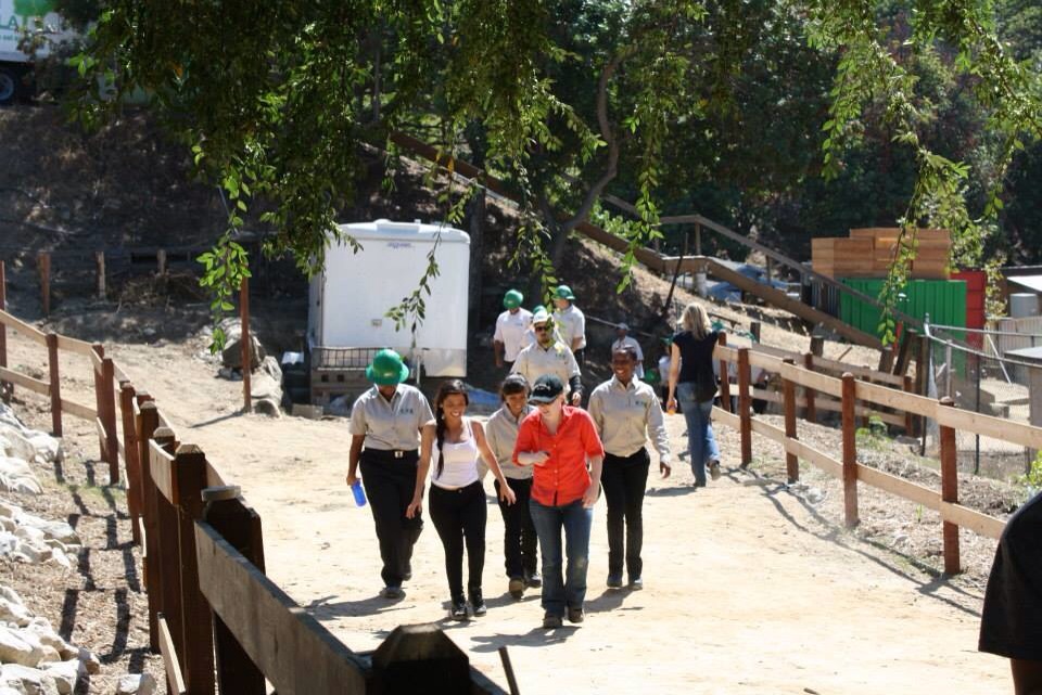 Jackie (in orange) on set.