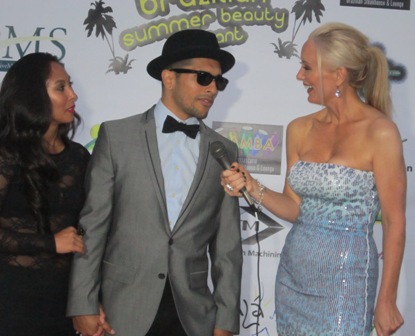 Andrea Anderson, Carpet host during 2012 Brazilian Summer Beauty Pageant with Violinist/Singer Mr. Q