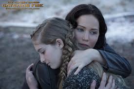 Willow Shields and Jennifer Lawrence in The Hunger Games Catching Fire