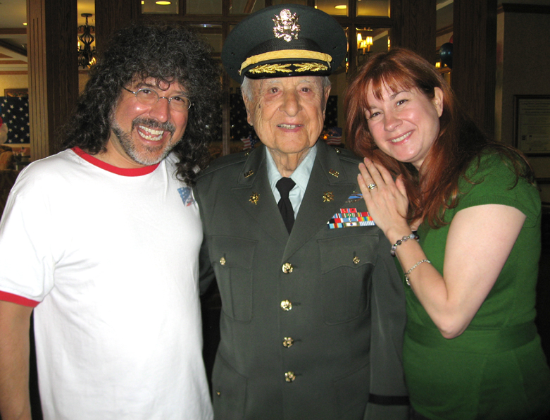 (Left to right) Mark Bonn, Dr. Dan Feller, Christine Bonn. With Dr. Feller on his 100th Birthday. Dr. Feller was at D-Day +2 at the age of 31.