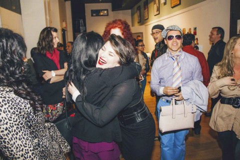 Actress Amanda Greer being hugged by Elle Madrona, founder of International Fashionistas after her portrayal of Melissa Horowitz in the staged reading of Eventually Yours in NYC, directed by Anthony Marinelli