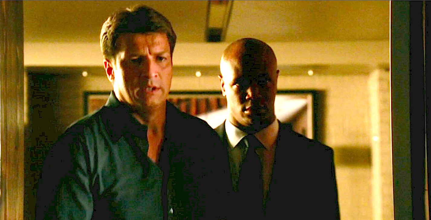 Still of Isaac Johnson and Nathan Fillion in Castle