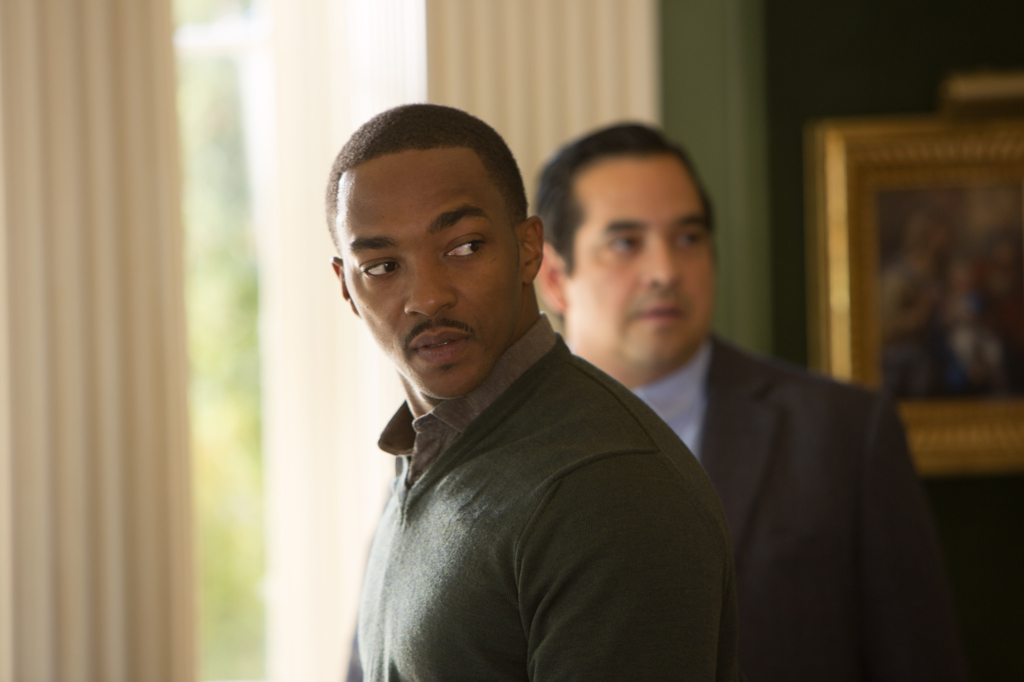 Still of Dominic Flores and Anthony Mackie in Our Brand Is Crisis (2015)