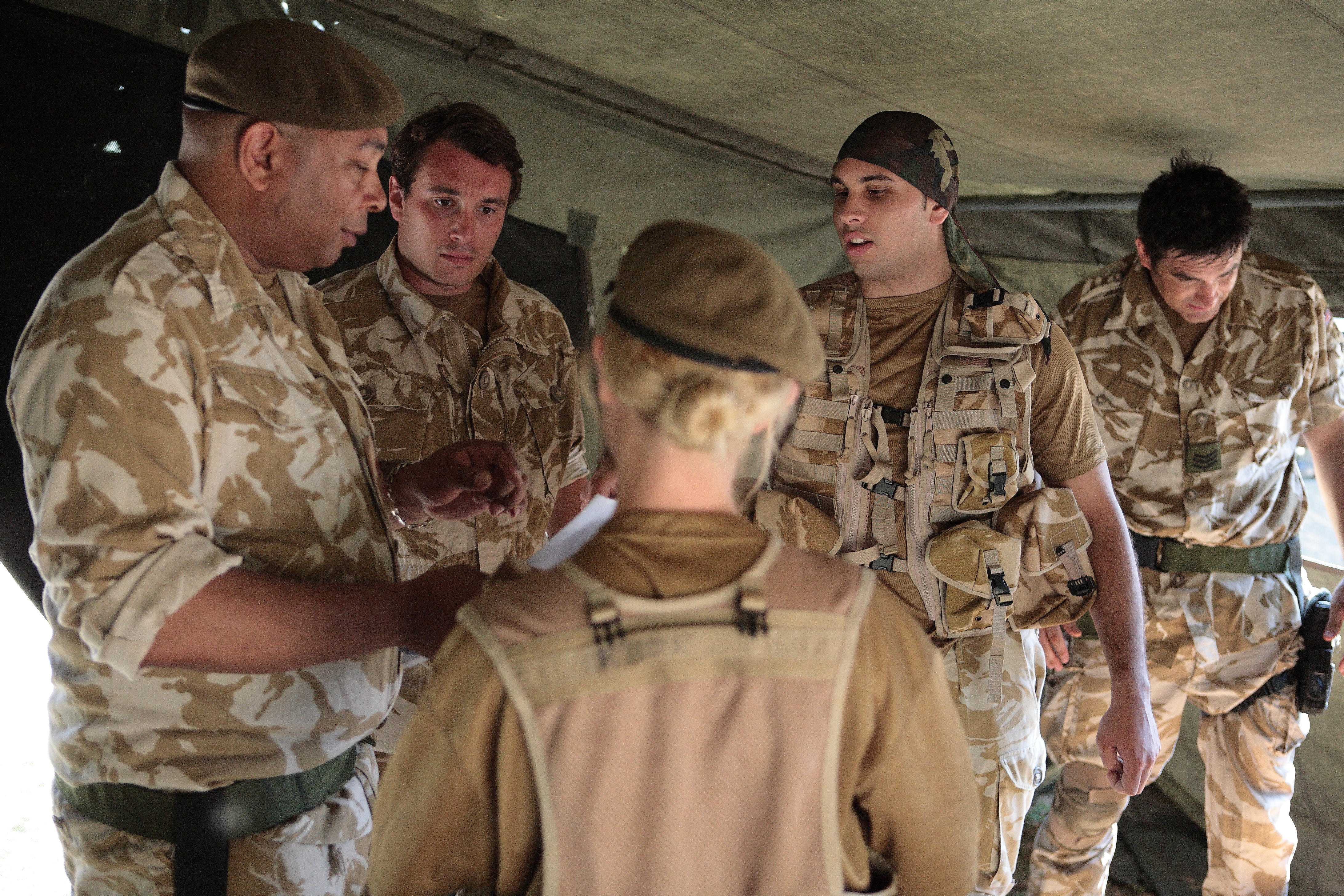 'A Landscape Of Lies' Lieutenant Hayes (Robby Haynes) briefs his troops on the mission ahead.