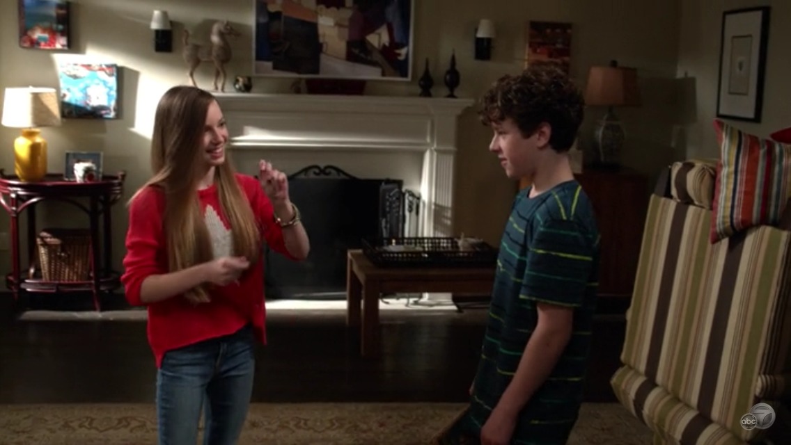 Still of Courtney Grosbeck and Nolan Gould in Modern Family (2013).