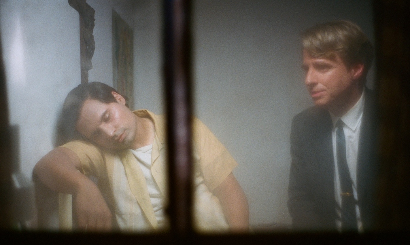 RFK in Chavez: Sen. Robert F. Kennedy (Jack Holmes) sits with Cesar Chavez (MIchael Pena) in 