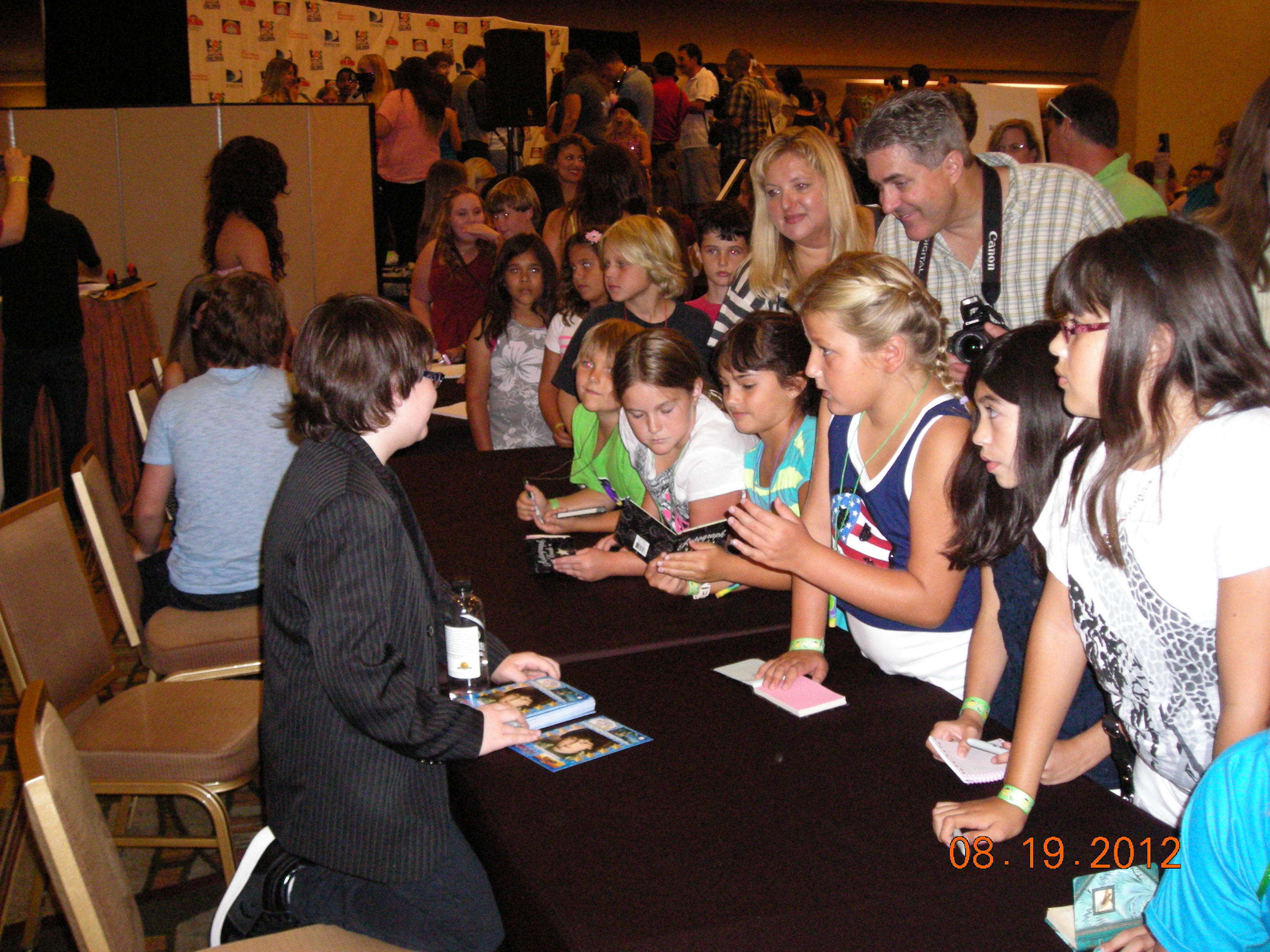 Me signing autographs at the CHOC 2012 Charity Event, in Anaheim, CA, on August 19, 2012. So honored to be an invited celebrity guest of this event, to raise funds for the Children's Hospital of Orange County.