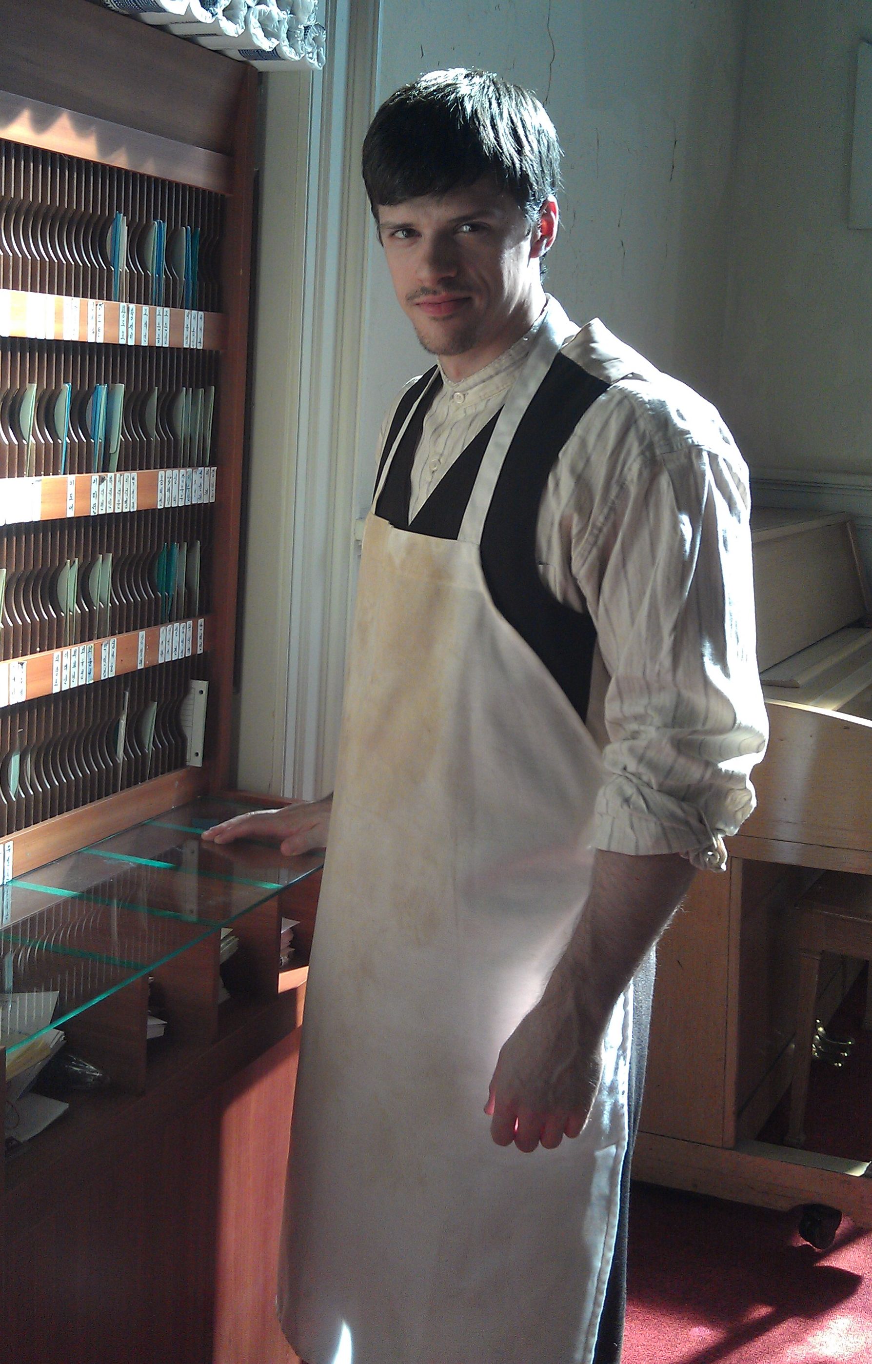 Production photo from Mysteries at the Museum as Andrew Kovalsky