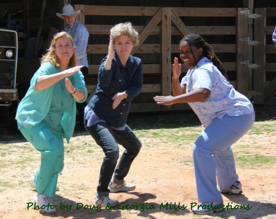 Goofing off on the set of McKenzie Farms with Heather Place and Kelita Simone.