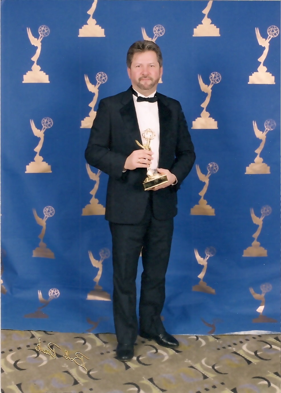 Douglas Wester receiving Emmy Award as Senior Producer for Outstanding Informational Programming, 2003