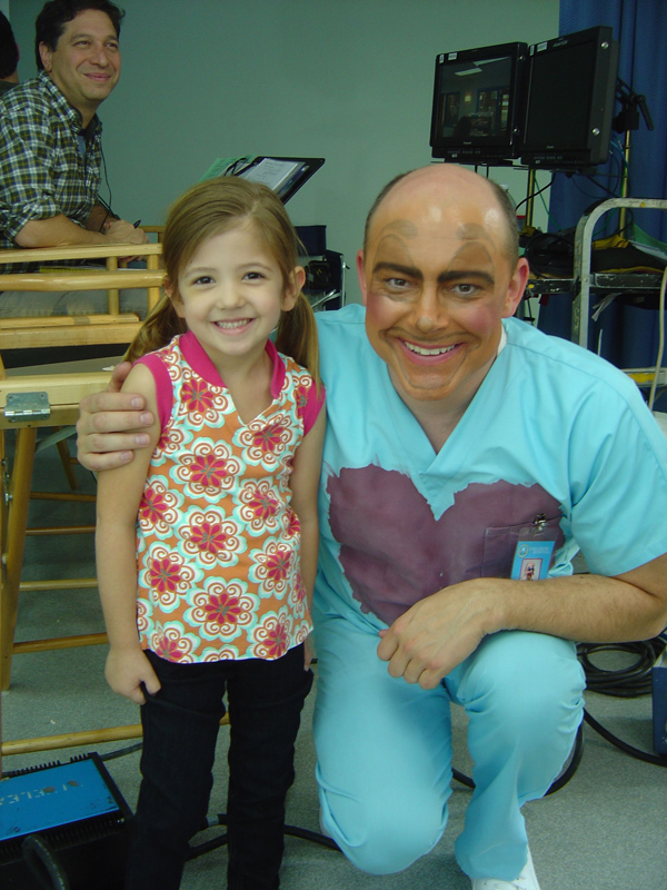 Cassidy Guetersloh and Rob Corddry on the set of 