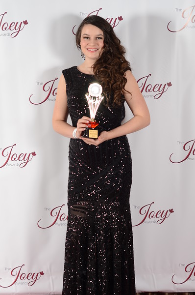 Winning Best Actress for a feature film. 2015 Joey awards.