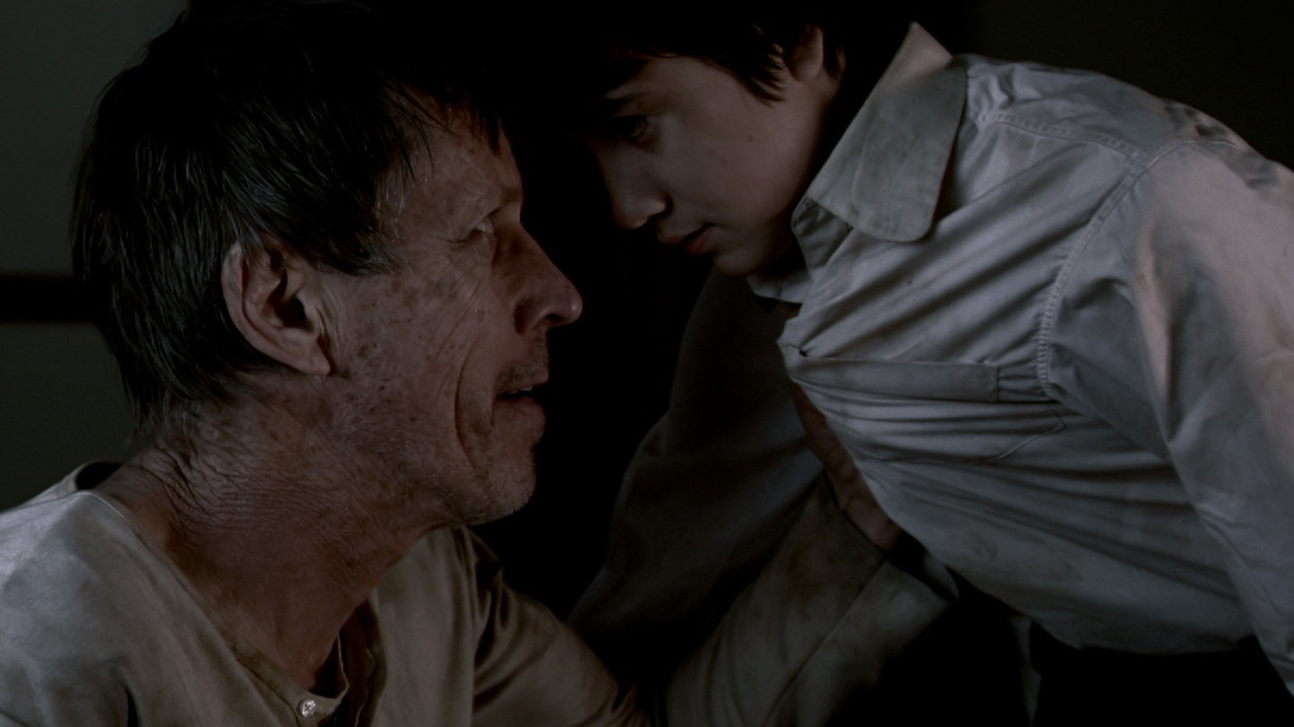 Bruce Spence and Will Birchall in The Occupants (2012)