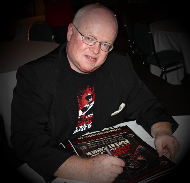 Autographing posters before the first showing of LOTPR.