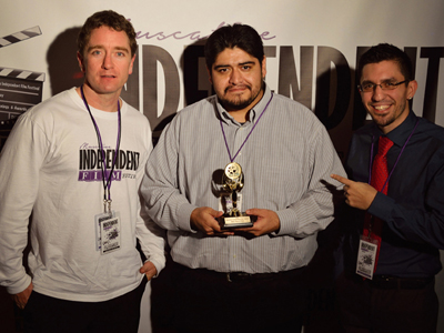 HUGO MATZ receiving the award for BEST SHORT FILM at the 2014 Muscatine Independent Film Festival.