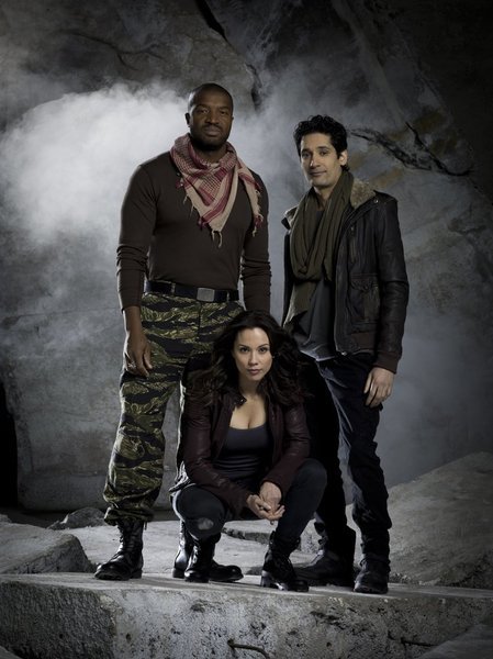 Still of Lexa Doig, Stephen Lobo and Matthew Kellog in Continuum (2012)