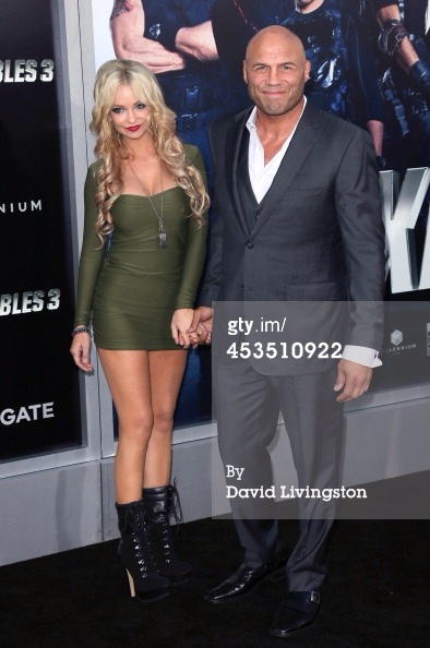 Randy Couture and girlfriend Mindy Robinson attend the premiere of The Expendables 3 in Hollywood