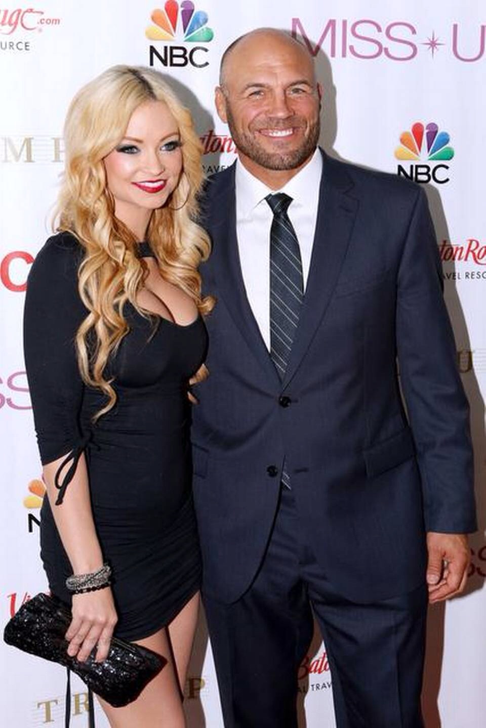 Randy Couture and girlfriend actress Mindy Robinson walk the carpet at the 2014 Miss USA pageant.