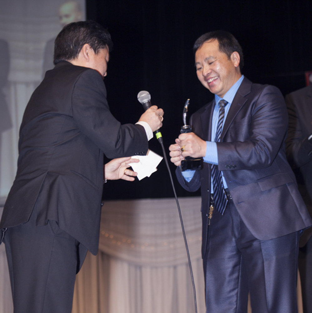 Received the best action actor/director of the year. Presented by Michael Thao.