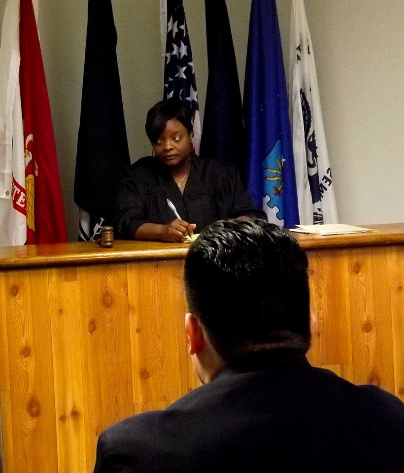 Courtroom scene from Inventing Karma (2013) written by Kris Williamson. Brent Burke (Jose Sanchez) looking on as Judge Harper (Lucci Di) awaits the verdict.