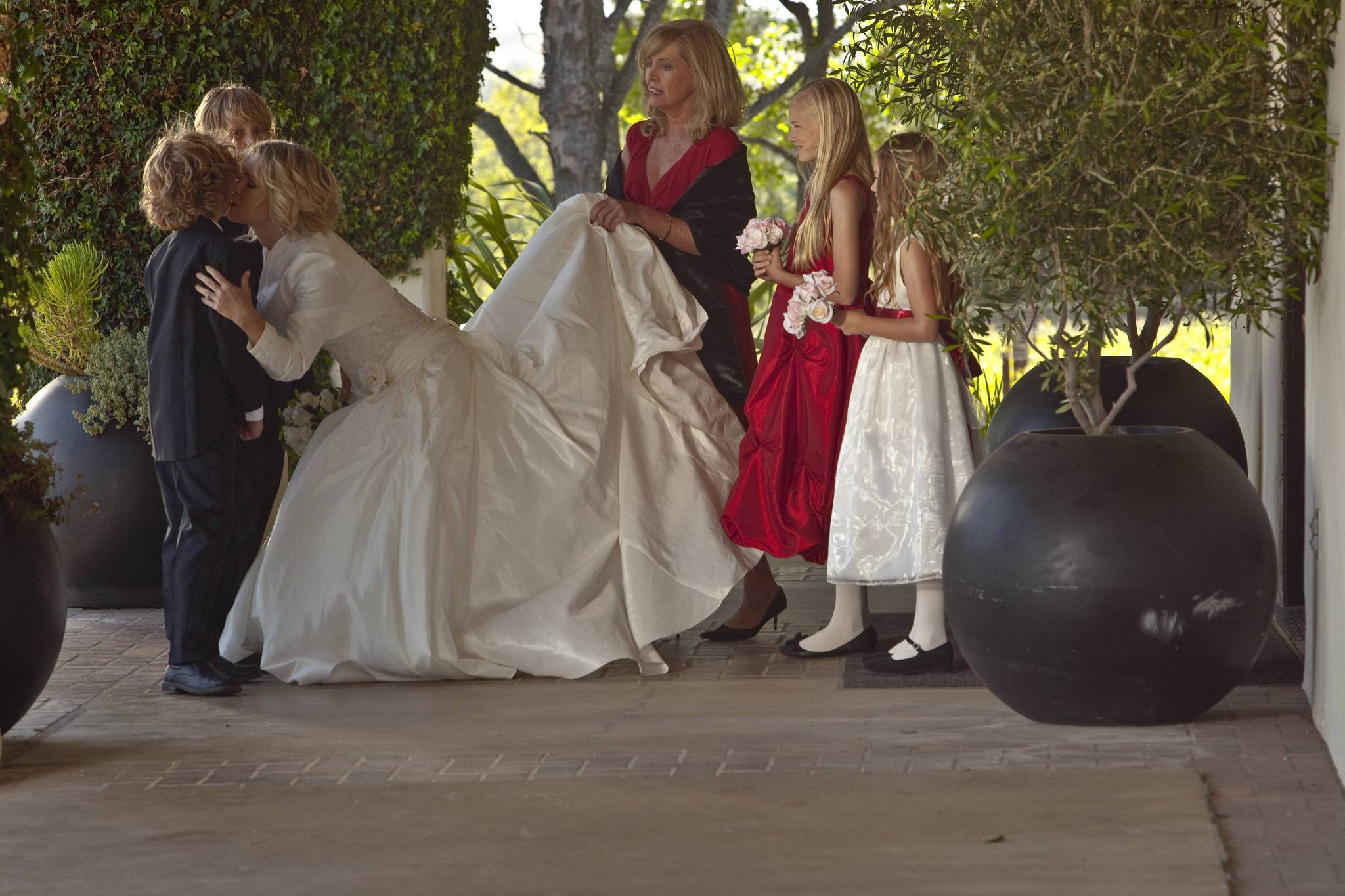 Still of Jennie Garth, Conrad Bluth and Riley Thomas Stewart in A Christmas Wedding Tail (2011)