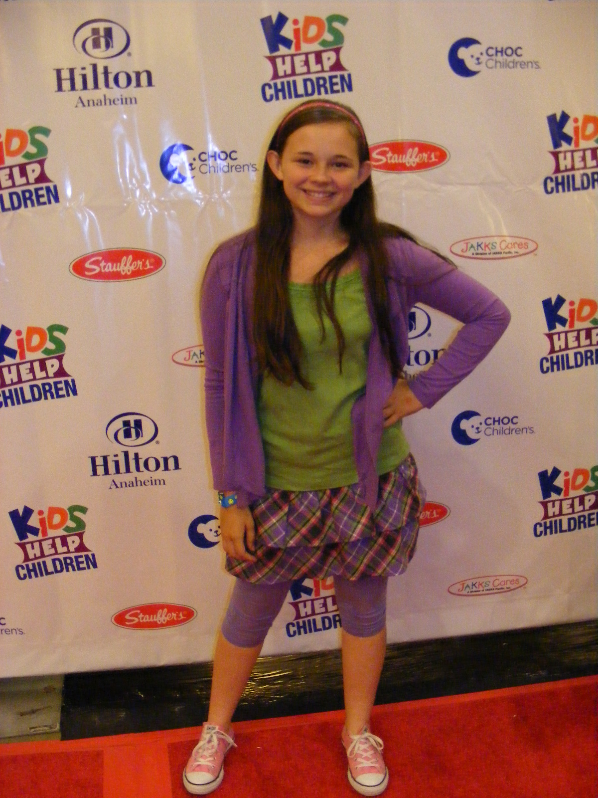 Cassie Earl on the red carpet at the Kids Help Children event in Anaheim, Calfornia