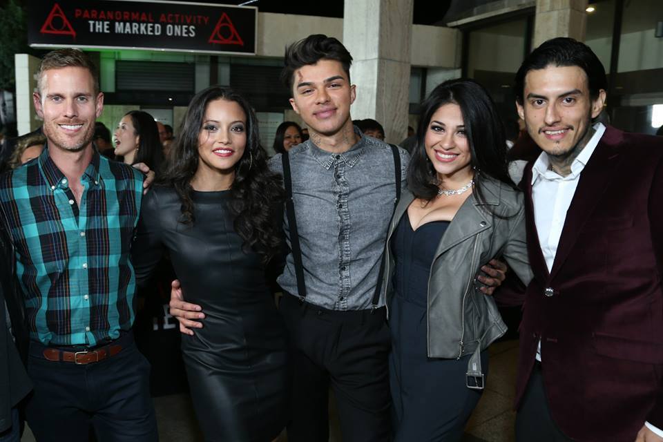 Director Christopher Landon poses at the Paranormal Activity: The Marked Ones premiere with actors Gabrielle Walsh, Andrew Jacobs, Noemi Gonzalez, and Richard Cabral.