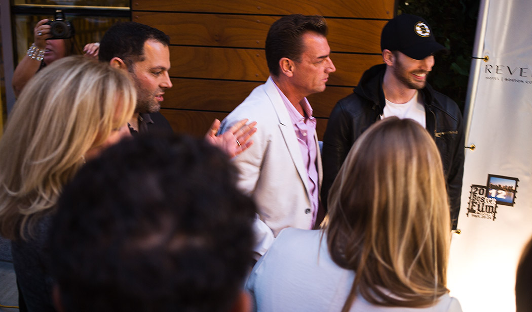 Glenn Camhi, Boston Film Festival organizers, & actor Chris Evans walking red carpet